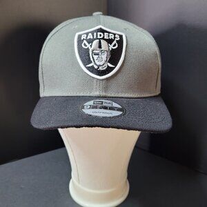 Oakland Raiders  New Era 9Fifty Snapback Hat.                               H043